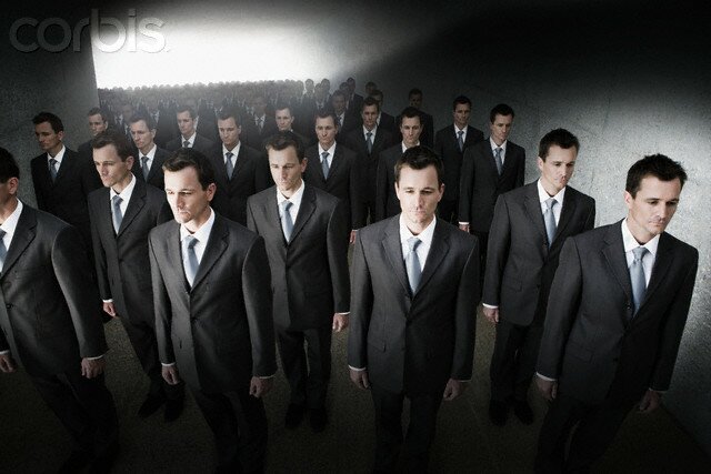Crowd of identical businessmen