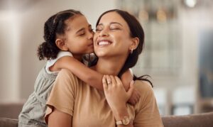 mom says her daughter’s teacher gave her a friendly hug, and it seemed to bother another mother